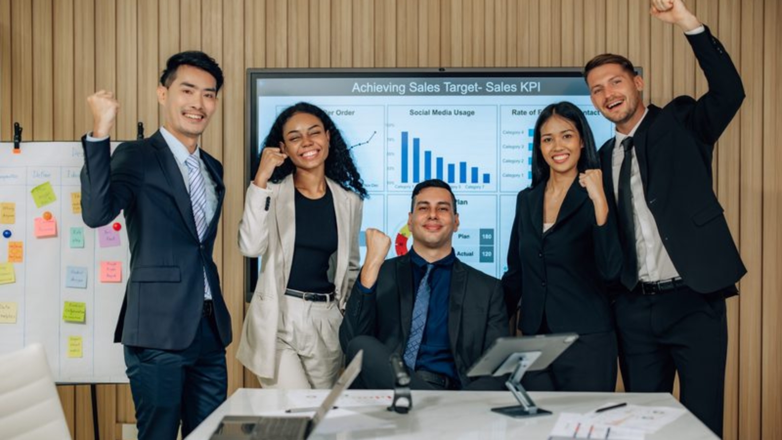 The multicultural business team engages in collaborative brainstorming sessions to develop cutting-edge strategies and new business model for achieving our sales key performance indicators (KPIs).